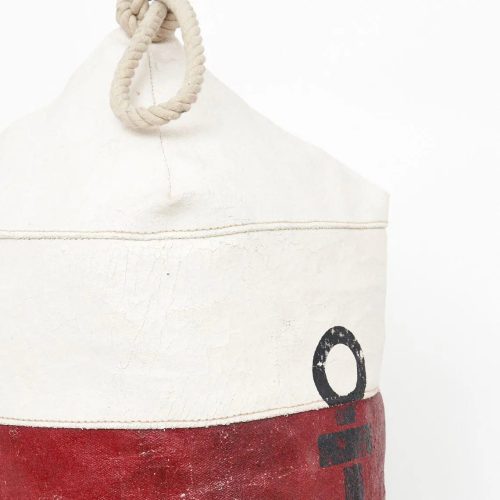 Cojín con forma de boya a rayas y ancla