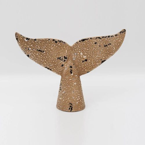 Cola de ballena de metal