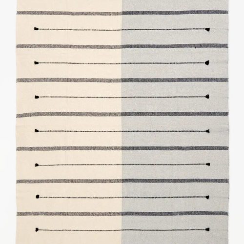 Manta de algodón en tonos beiges y grises