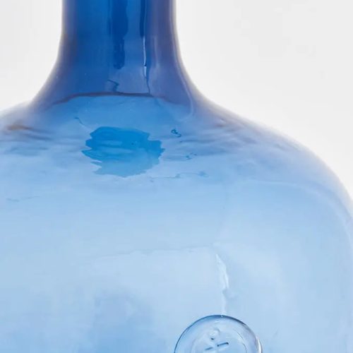 Botella de cristal con sello de ancla