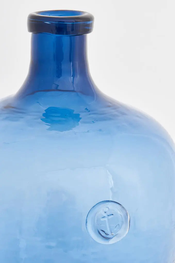 Botella de cristal con sello de ancla