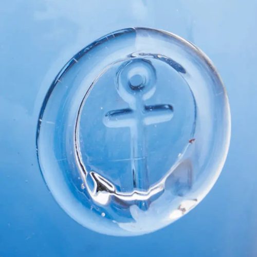 Botella de cristal con sello de ancla
