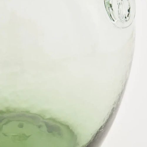 Botella de cristal con sello de ancla