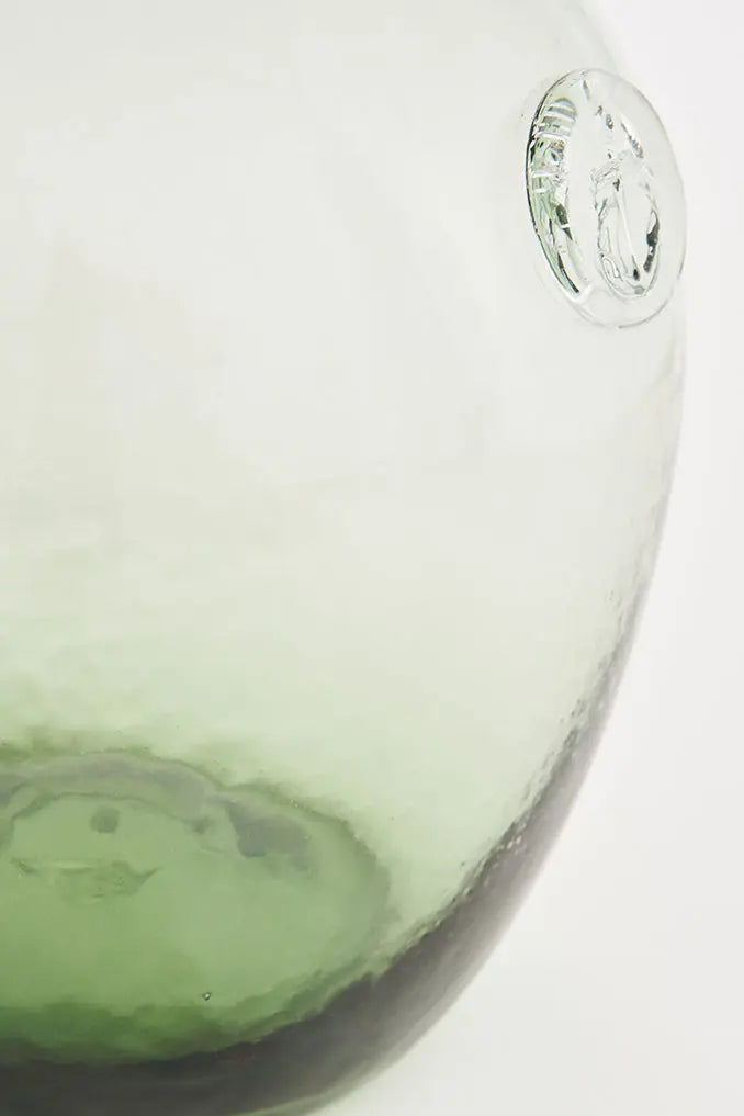 Botella de cristal con sello de ancla