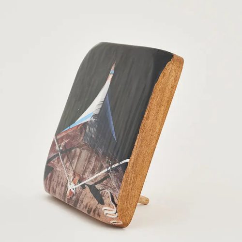 Foto sobre taco de madera barca