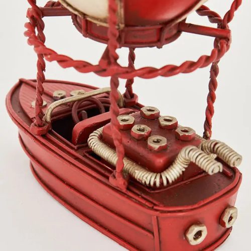 Globo con barca de metal